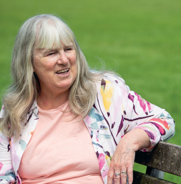 Foster carer Jenny wearing a pink tshirt and white blouse
