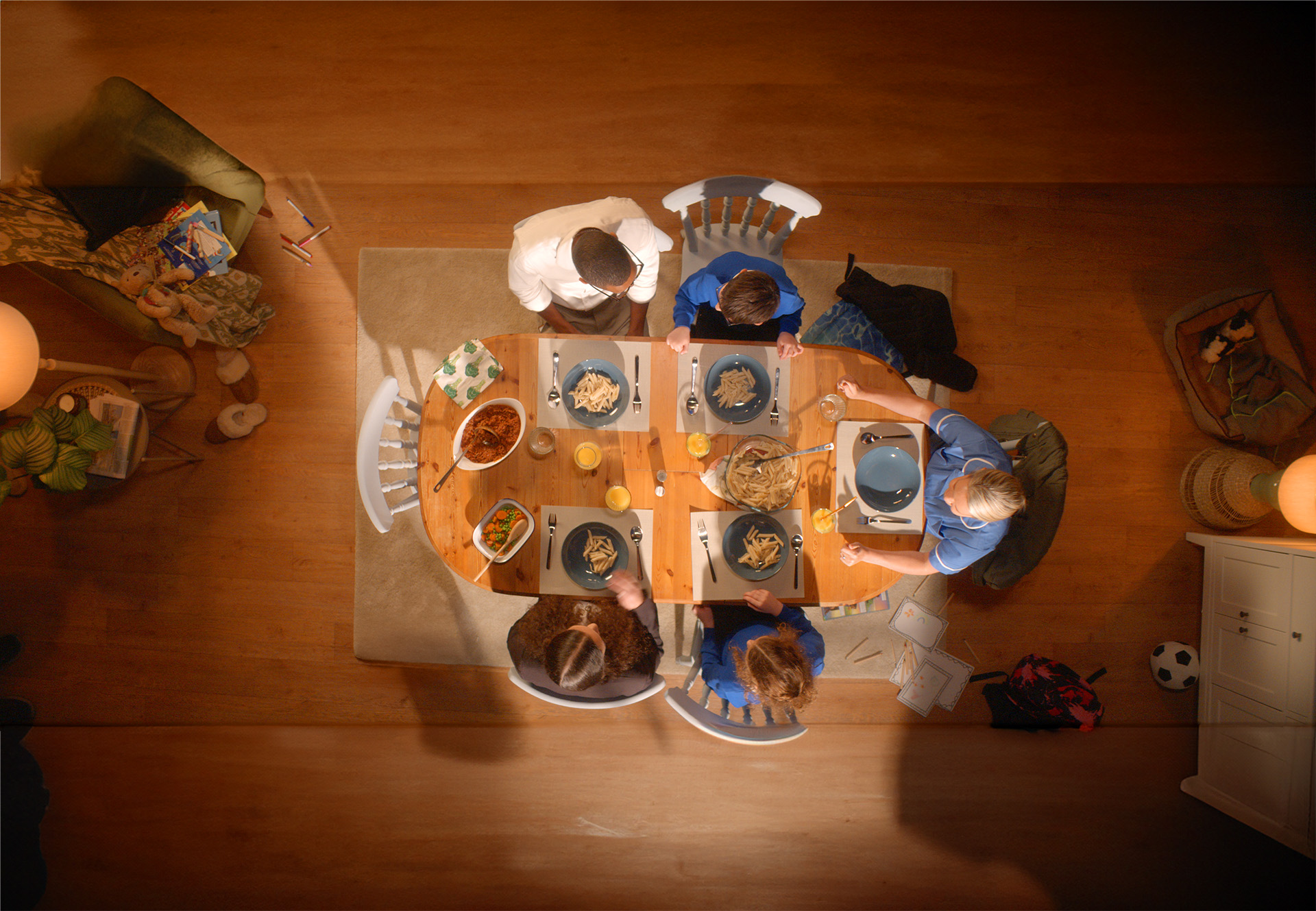 family sitting at the table having a meal