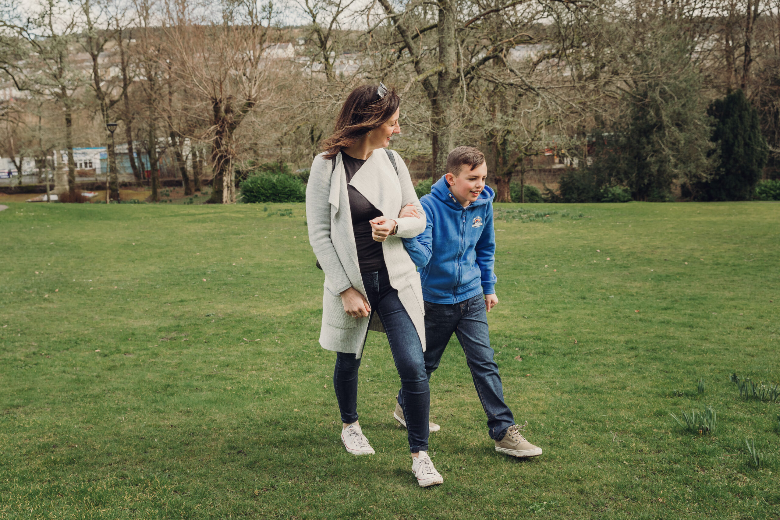 Carer and young person going for a walk